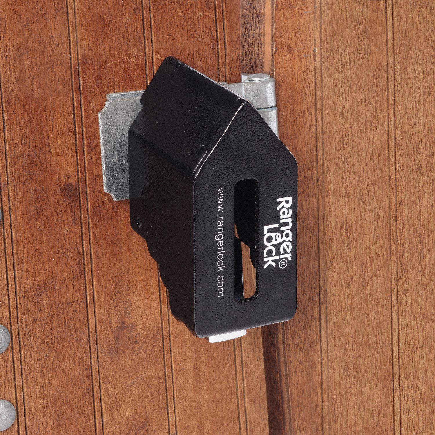 Protect lock on gate latch, trailer door